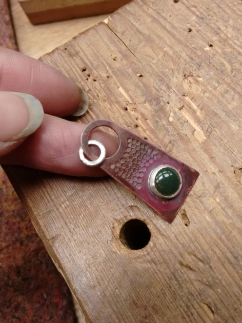 Copper, silver and unknown stone pendant